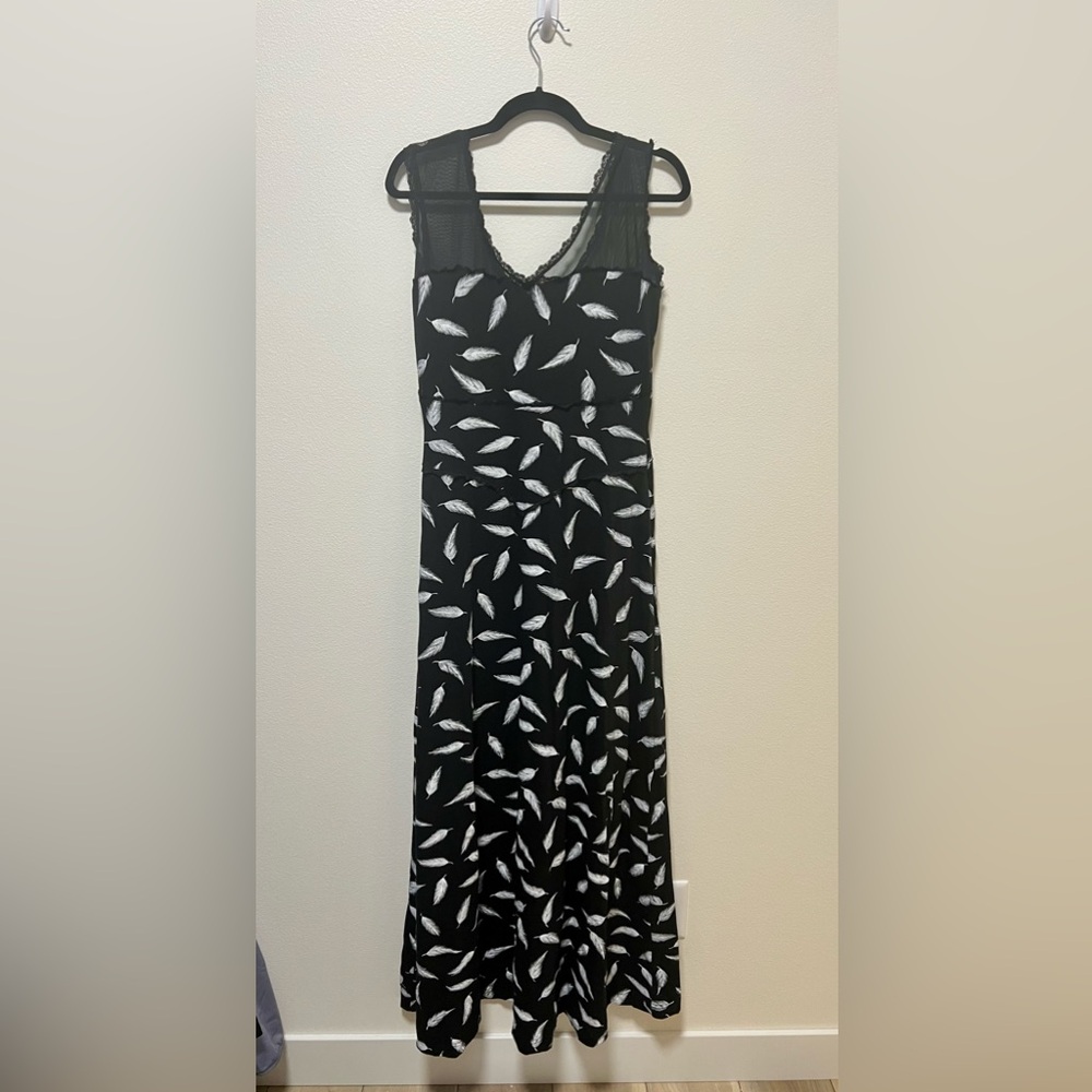 Maxi dress with feathers